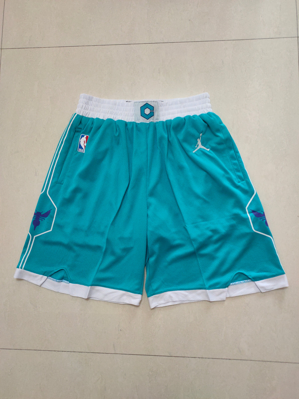 Turquoise Hornets shorts