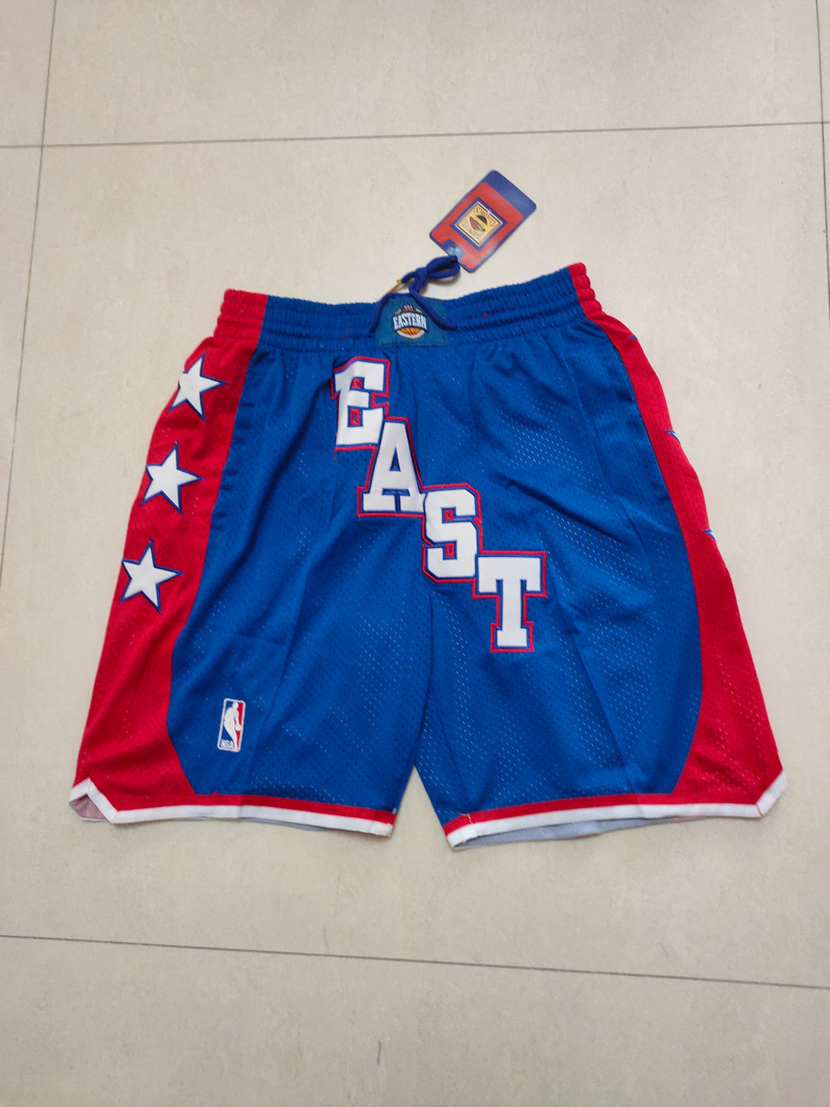 Pantalones All-Star azul y rojo