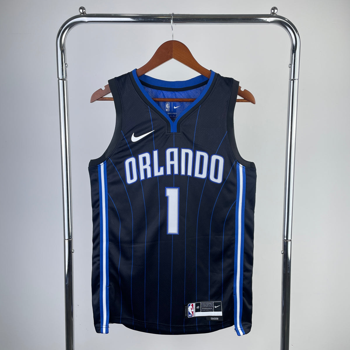 Camiseta mágica sin mangas negra y azul