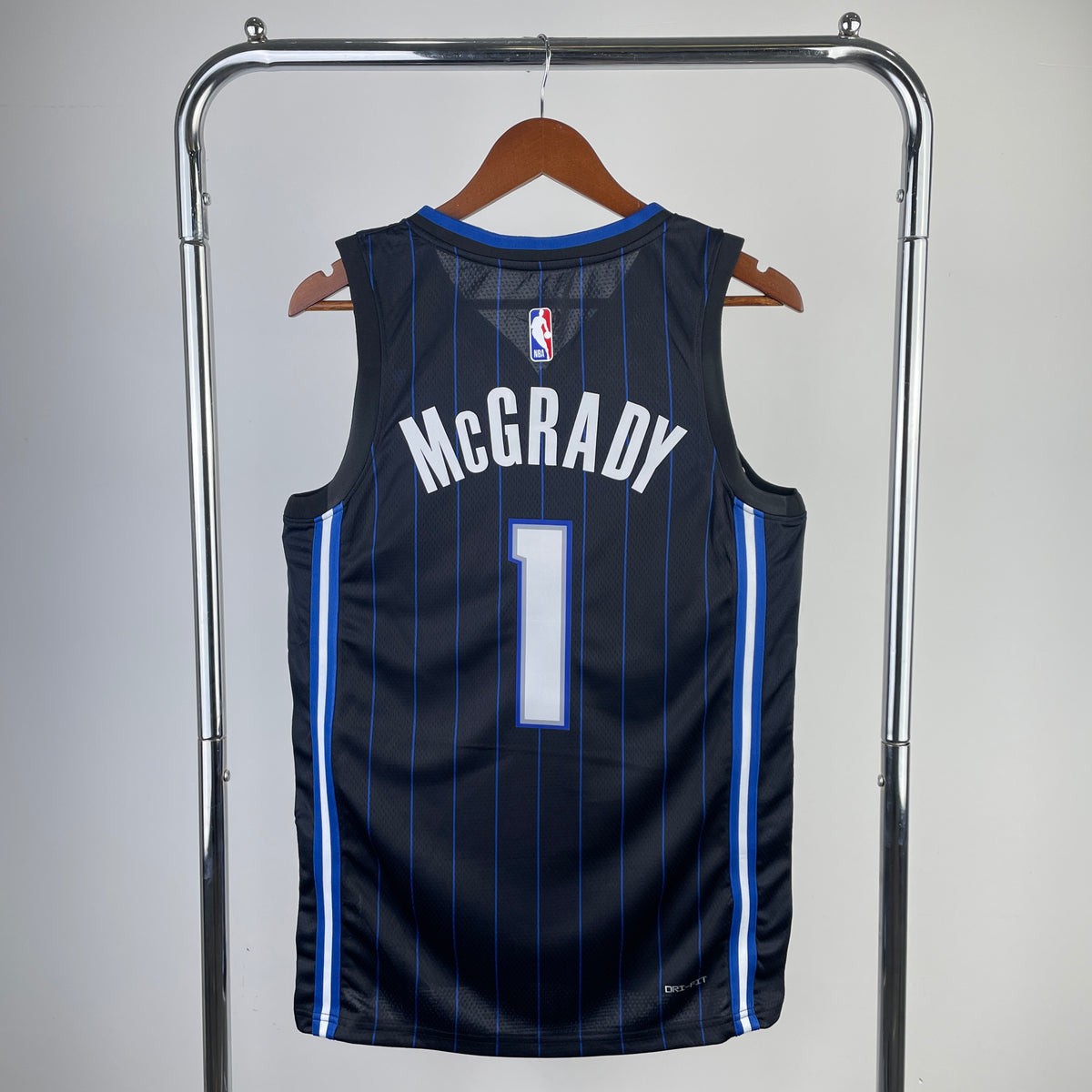 Camiseta mágica sin mangas negra y azul