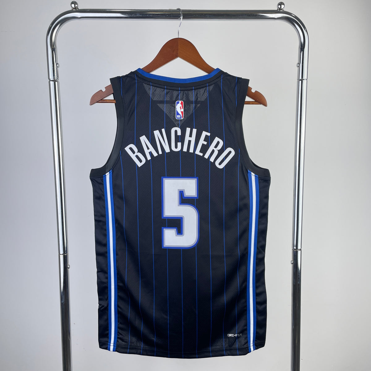 Camiseta mágica sin mangas negra y azul